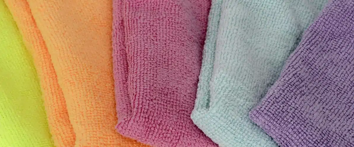 Multicolored microfiber cleaning cloths for household cleaning.